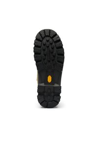 Svart gummisula med ett robust mönster av cirkulära knottror, en gul Vibram-logotyp och texturerade kanter för grepp och hållbarhet.
