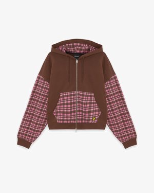 Brūna jakas ar rāvējslēdzēju un rozā плюšara dizainu uz piedurknēm un kabatas. Iekļauj odere cepurē un mazu dzeltenu logo uz kabatas.