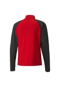 Chaqueta de manga larga roja y negra con un alto cuello y mangas en contraste. Tela suave con un diseño deportivo y una forma ajustada.