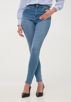 - Jeansy Skinny Fit