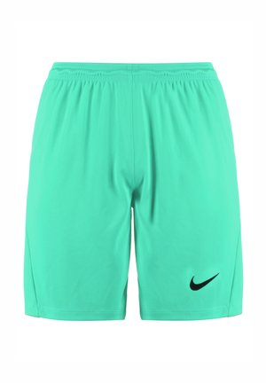 Pantaloni corti Nike di un verde chiaro con cintura elastica e logo nero sulla gamba sinistra. Tessuto liscio, taglio fino al ginocchio, senza tasche o fantasie.