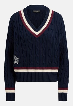 Navy blue cable-knit sweater with a V-neck, featuring maroon and cream stripes at the neckline and hem, and an embroidered logo on the chest.
