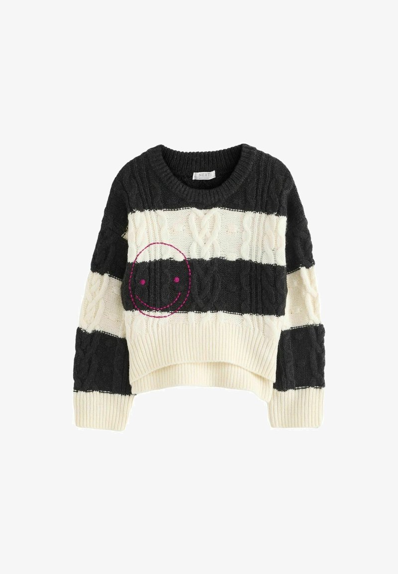 Pull en tricot rayé noir et blanc avec motifs torsadés et un petit smiley rose brodé sur la poitrine gauche.