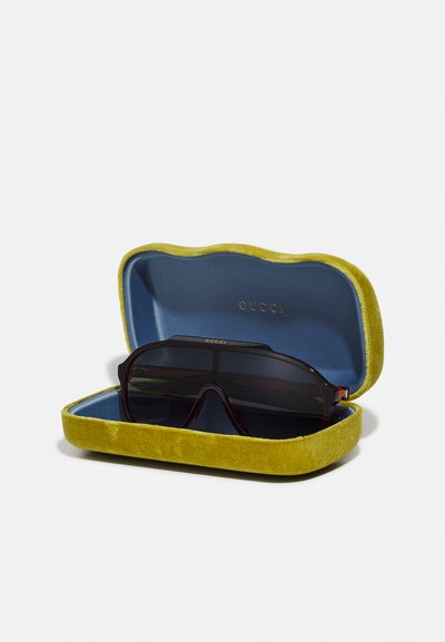 Gucci Slnečné okuliare - black/grey