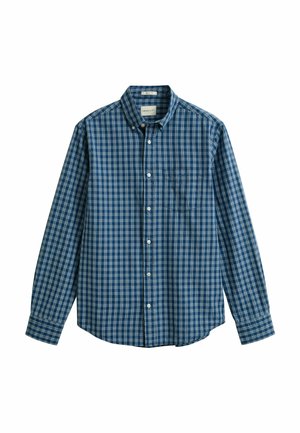 Chemise à manches longues à carreaux bleus et blancs avec col et poche poitrine, présentée sur fond blanc.