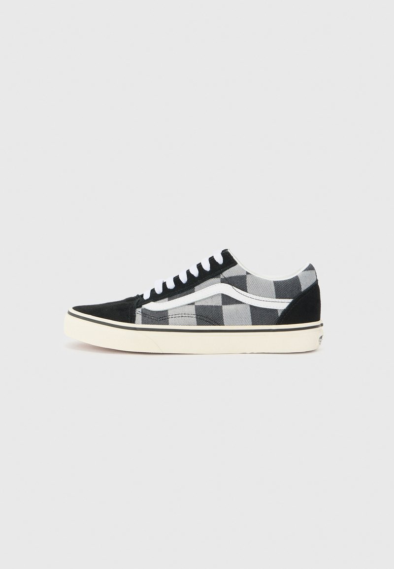 Black and white plaid canvas sneakers with a black suede toe cap, white laces, and cream rubber sole. Features a signature side stripe design.