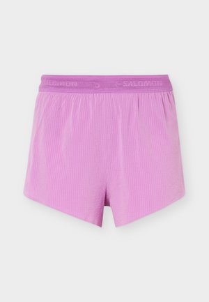 Heledad lillad sportlikud lühikesed püksid elastse vöökohaga ja peene tekstuuriga kangaga, mis on loodud mugavuse ja liigutuste vabaduse tagamiseks.