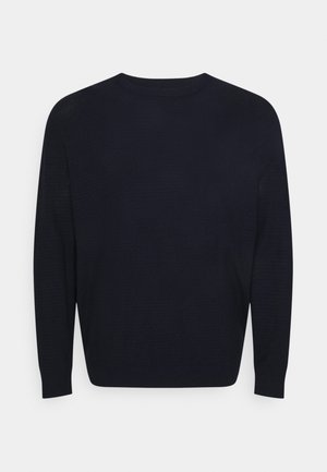 Dark navy blue long-sleeve crewneck sweater with a fine knit texture and fitted cuffs and hem.