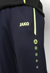 JAKO ALLROUND - Jogginghose - marine/neongelb