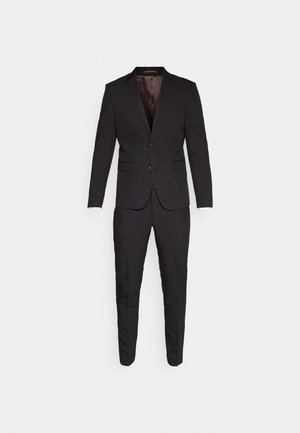 Black suit featuring a single-button blazer with notch lapels and matching trousers. Smooth fabric with a tailored fit and subtle sheen.