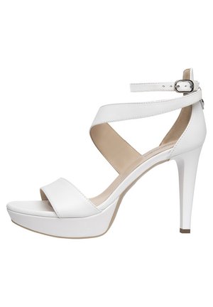 White high heel sandal featuring a smooth faux leather upper, ankle strap with buckle, open toe, and platform sole for added height.