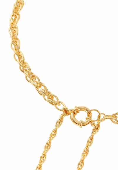 Collier en chaîne dorée avec des maillons ovales et ronds entrelacés, doté d'un fermoir circulaire et de deux accents décoratifs en chaîne.