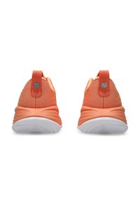 Orange athletic shoes with a textured fabric upper, rubber heel, and white sole. Features pull tabs and subtle branding on the heel.