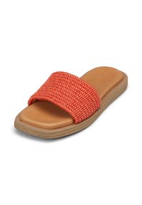 Coral woven slide sandal with a wide strap, tan footbed, and textured sole. Soft material and rounded shape for comfort.
