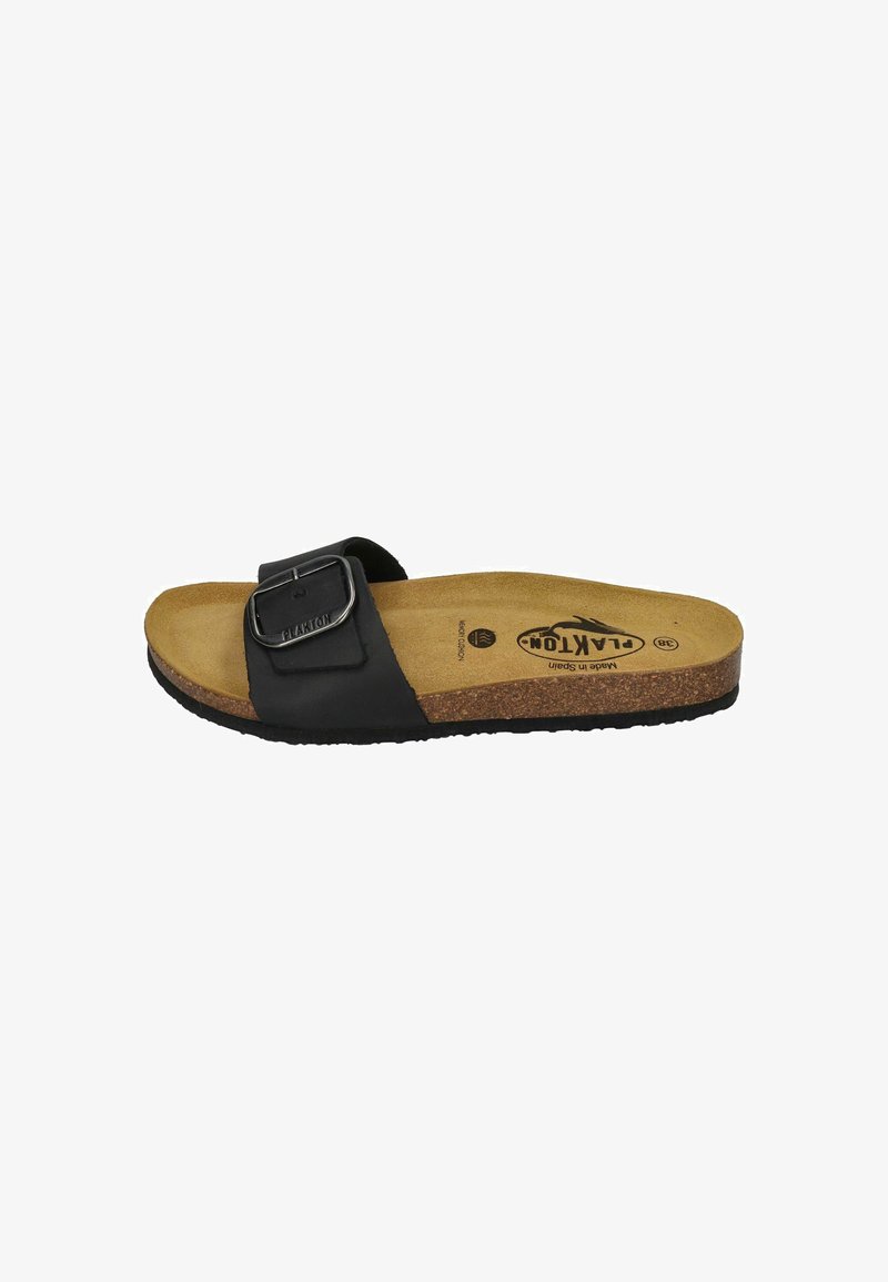 Black slide sandal with a textured upper, adjustable metal buckle, and a cork footbed. Flat outsole with a rubber grip.