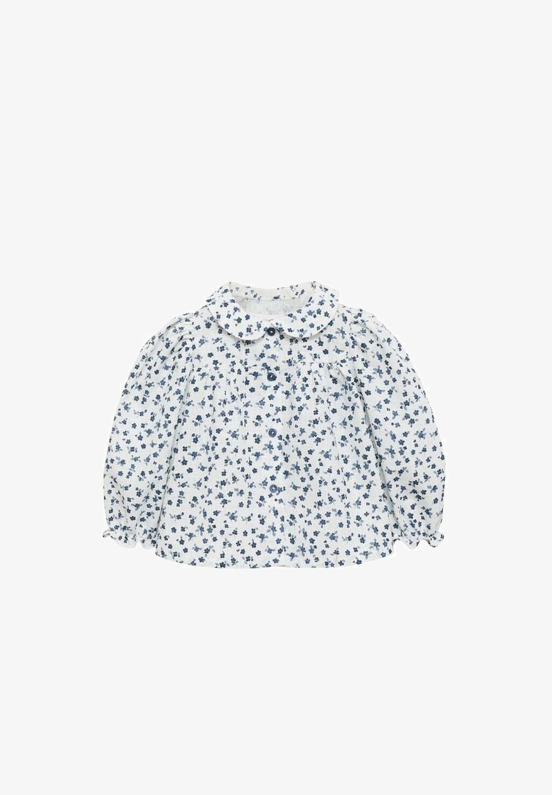 White blouse with blue floral pattern, round collar, long puffed sleeves, and button closure down the front. Soft fabric with slight texture.