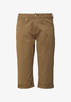 Pantalons cropped beige en tissu coton doux, avec des poignets retroussés, des poches avant et une fermeture à bouton argenté avec des coutures décoratives.