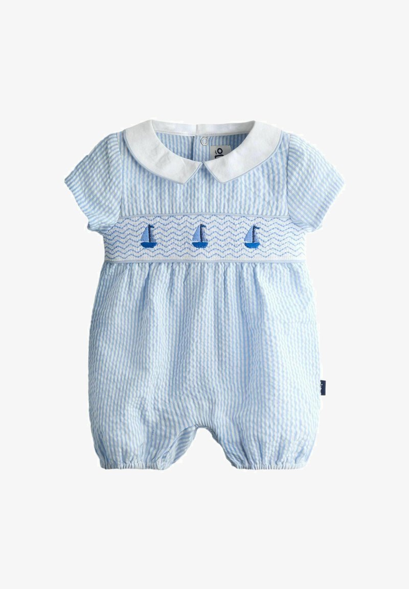 Combinaison en coton rayée bleu et blanc avec manches courtes, col blanc et motifs de voiliers brodés sur la poitrine. Poignets élastiqués.