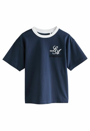 Navy blue cotton t-shirt with a white ribbed crew neck, featuring a front pocket design with "LA" and "LOS ANGELES" in white and black text.