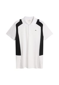 Vit polo skjorta med svarta detaljer. Kortsleeves, klassisk krage, tillverkad av slät tyg. Har en logo på bröstet och sidodetalj.