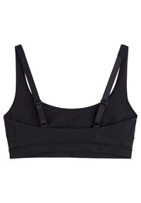 Svart bralette med breda band, sömlös design och mjukt tyg. Har justerbara axelband för en skräddarsydd passform. Enkelt och minimalistiskt stil.