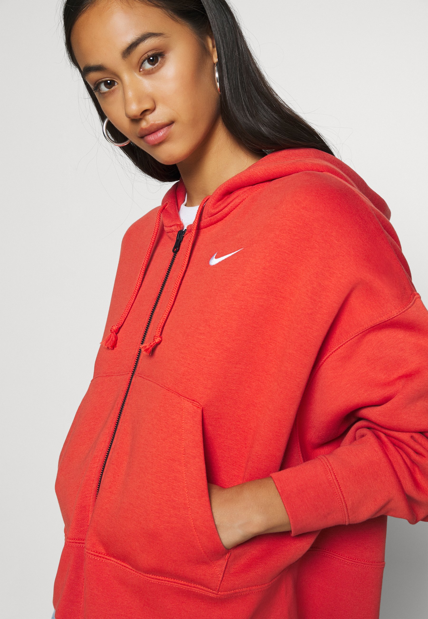 orange nike hoodie zip up