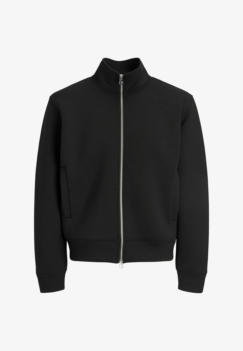 Veste noire à manches longues zippée avec col montant et deux poches latérales, présentée sur fond blanc.