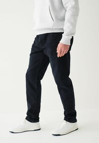 Next ESSENTIAL STRETCH - Traperice uskog kroja - ink blue