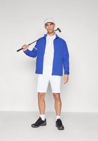J.LINDEBERG Sports HEATH - Lauko striukė - clemantis blue