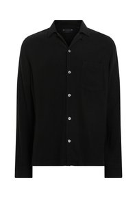 Chemise noire à manches longues en tissu texturé, dotée d'un col, d'une poche avant et d'une fermeture à boutons avec des boutons argentés.