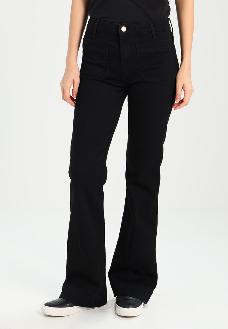 Wrangler FLARE Trousers retro black/black Zalando.ie