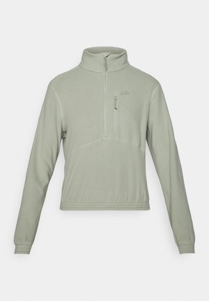 Light green fleece pullover with a half-zip collar, front zip pocket, and elasticated cuffs. Flatlock seams add detail to the design.