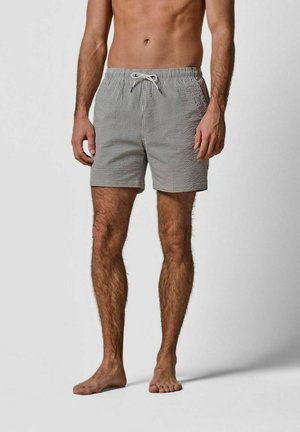 Herre badeshorts i sort-hvidternet mønster med elastik i taljen og snøre, knælængde og letvægtsstof.