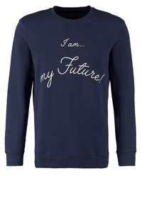 Sweat-shirt bleu marine à manches longues avec un texte blanc en cursive indiquant ""I am... my Future!"" sur le devant.