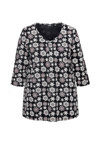 Tunique noire avec un col en V, des manches trois-quarts et un motif floral de flocons de neige rouges et blancs sur un tissu texturé.
