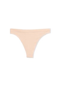 Tanga beige in cotone con vita senza cuciture, forma triangolare e senza motivi o decorazioni. Texture morbida con copertura minima.