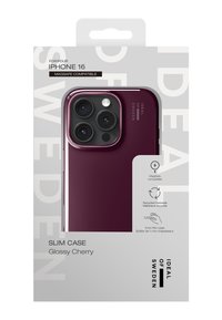 Ohut kuori iPhone 16:lle kiiltävässä kirsikanpunaisessa värissä. Valmistettu kierrätysmateriaaleista, MagSafe-yhteensopiva, 1 mm paksu.