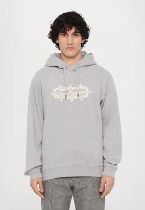 Gray hoodie made of cotton blend, featuring a drawstring hood and decorative white text in an ornate design on the front.