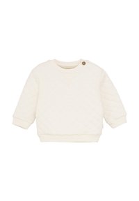 Sweat-shirt capitonné crème clair avec des poignets et un ourlet côtelés. Présente un col rond et un détail de bouton sur l'épaule.