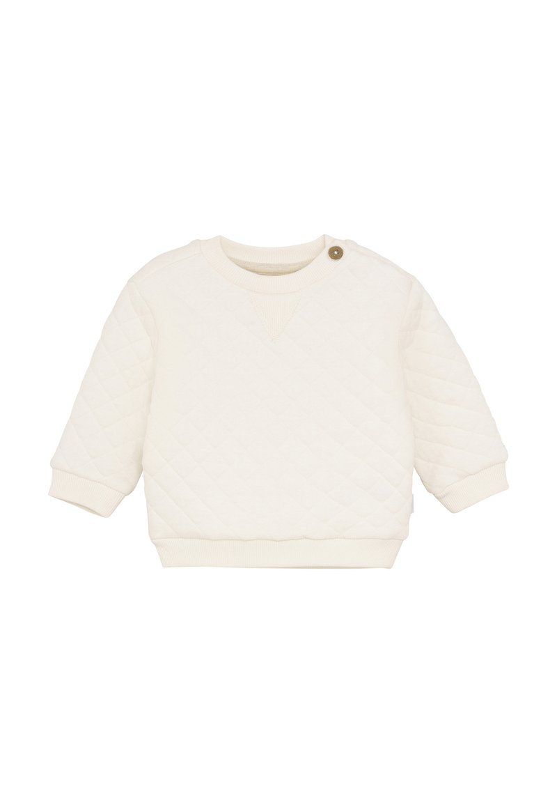 Sweat-shirt capitonné crème clair avec des poignets et un ourlet côtelés. Présente un col rond et un détail de bouton sur l'épaule.