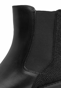 Marco Tozzi Bottines à plateau - black