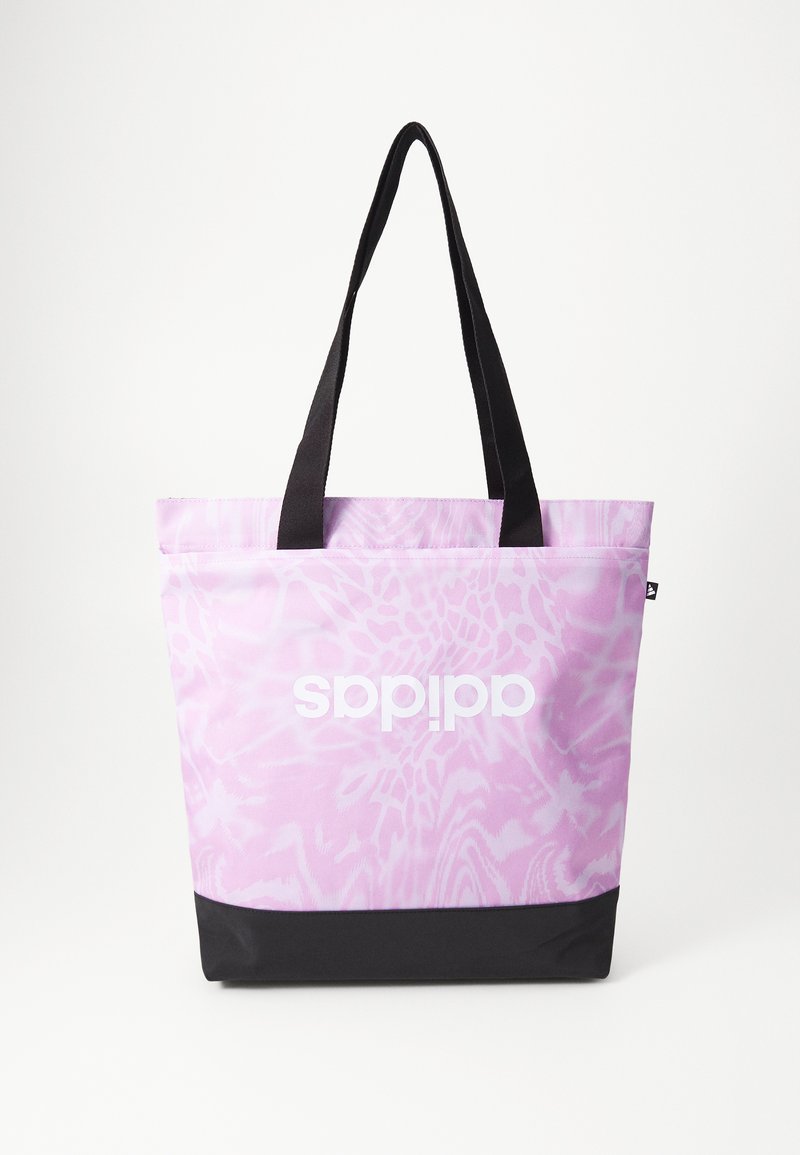 Borsa a spalla rosa e bianca con motivi, con dettagli e manici neri. Presenta un grande logo bianco sulla parte anteriore. Materiale resistente, forma rettangolare.
