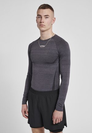 HMLTE MIKE SEAMLESS - Sport T-shirt - black asphalt melange