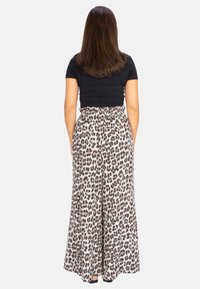 Seasons of April DANI LEO MUSSELIN - Stoffhose - weiß