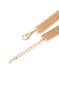 Bracciale in metallo dorato con catena caratterizzato da design intrecciati, chiusura a moschettone e catena regolabile con un charm ovale all'estremità.