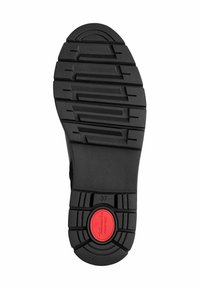 Semelle de chaussure en caoutchouc noir avec un design de grip texturé. Présente un accent circulaire rouge et le numéro "37" imprimé sur la surface.