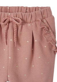 Rosa Jogginghose mit einem gerafften Saum, ausgestattet mit einem geflochtenen Kordelzug, goldenen Herzmustern und einem weichen, strukturierten Material.