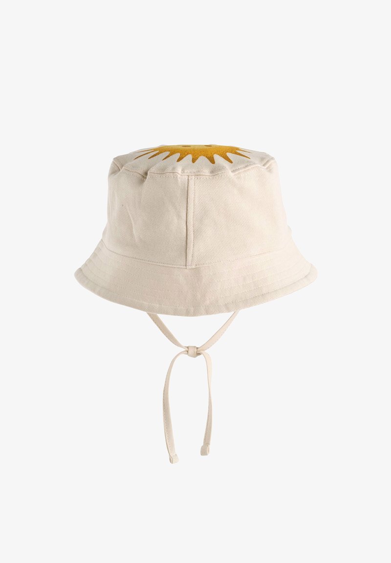 Beiger Canvas-Bucket-Hut mit gelbem Sonnenmuster auf der Oberseite. Verfügt über verstellbare Bänder für einen sicheren Sitz. Weiche Textur und strukturierter Schnitt.
