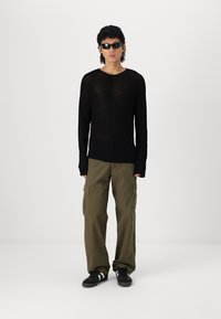 Night Addict Πουλόβερ - black