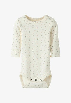 Body à manches longues en ribbed crème avec un imprimé floral rose et jaune, présentant un col à volants et trois pressions à la base.